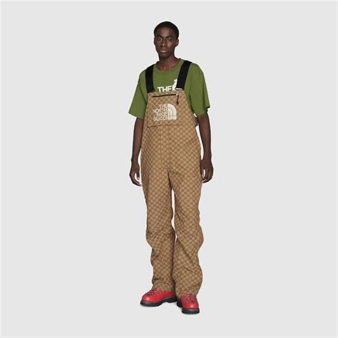 north face gucci overalls